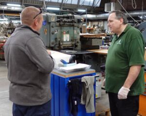 discussing production and hand engraving